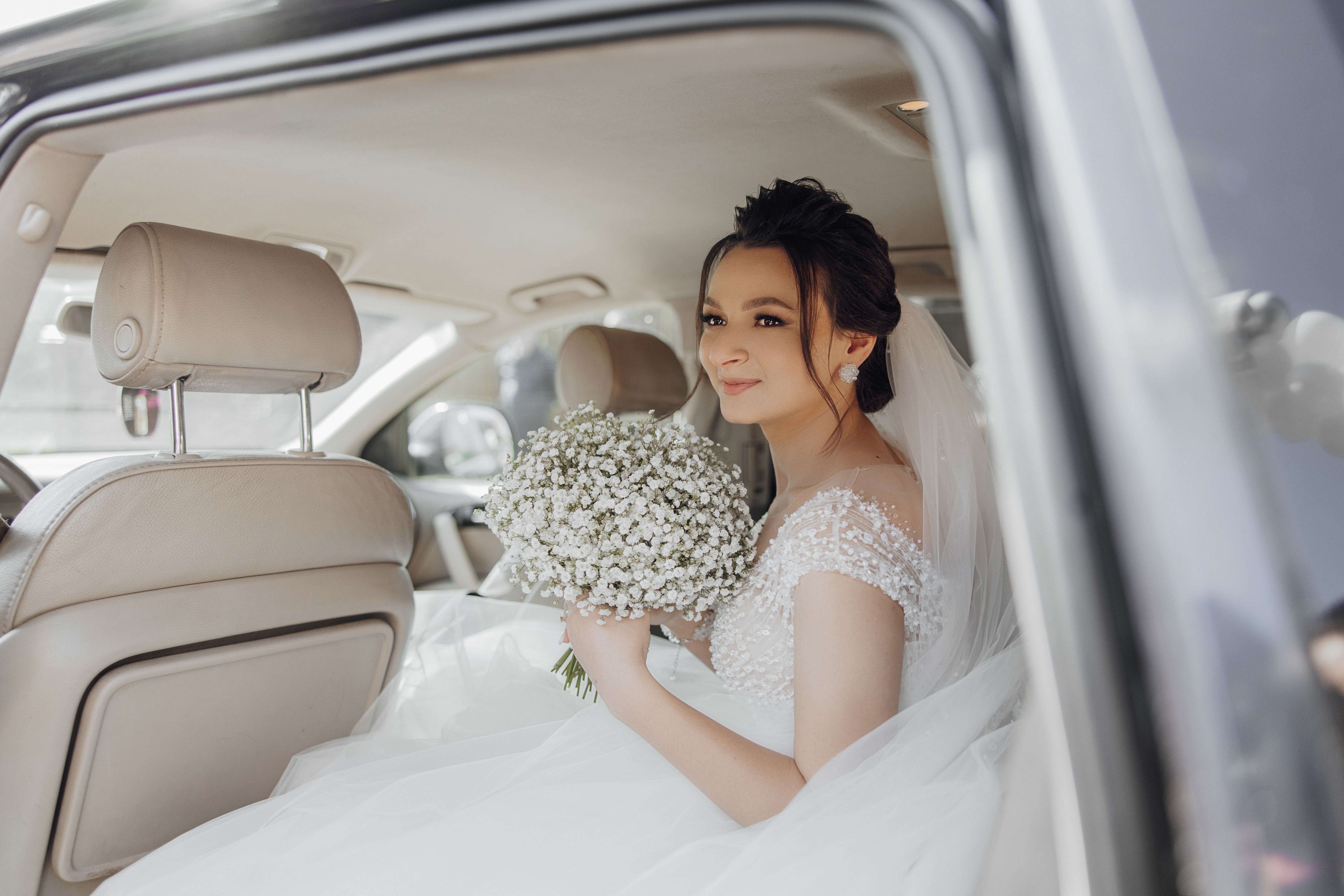 Happy Bride In Car